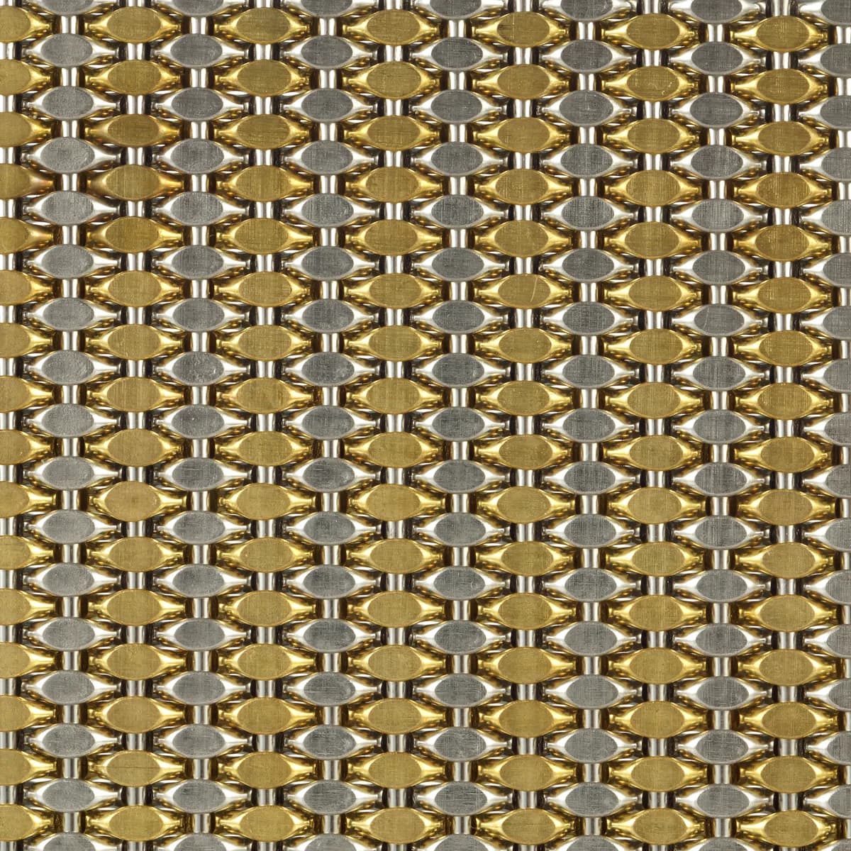 Open architectural metal mesh grid showing the relationship between visible metal and clear opening