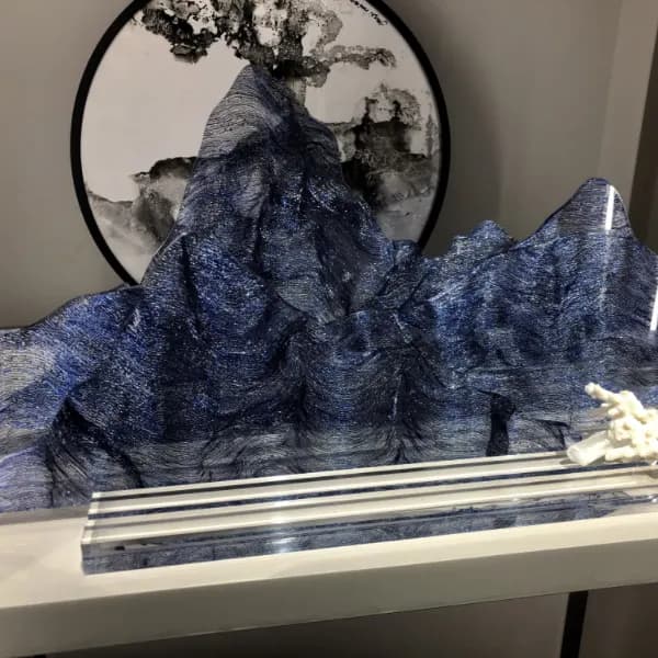 User-supplied application reference of a blue sculptural object