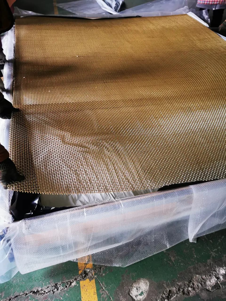 Mesh and protective materials shown during packing preparation