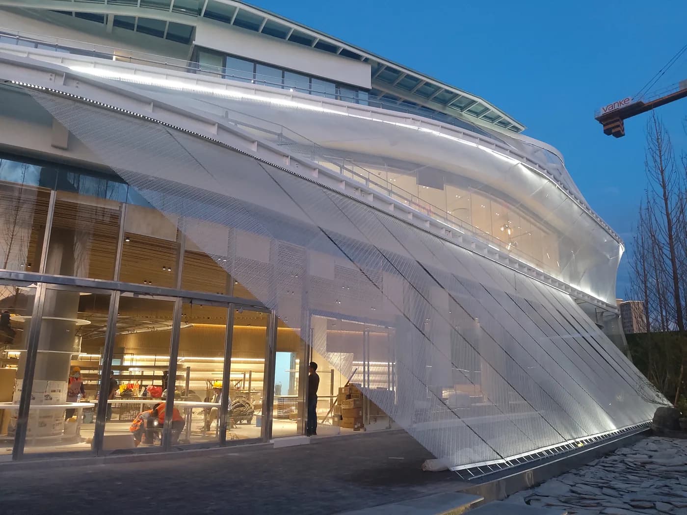 Exterior architectural metal mesh facade project record