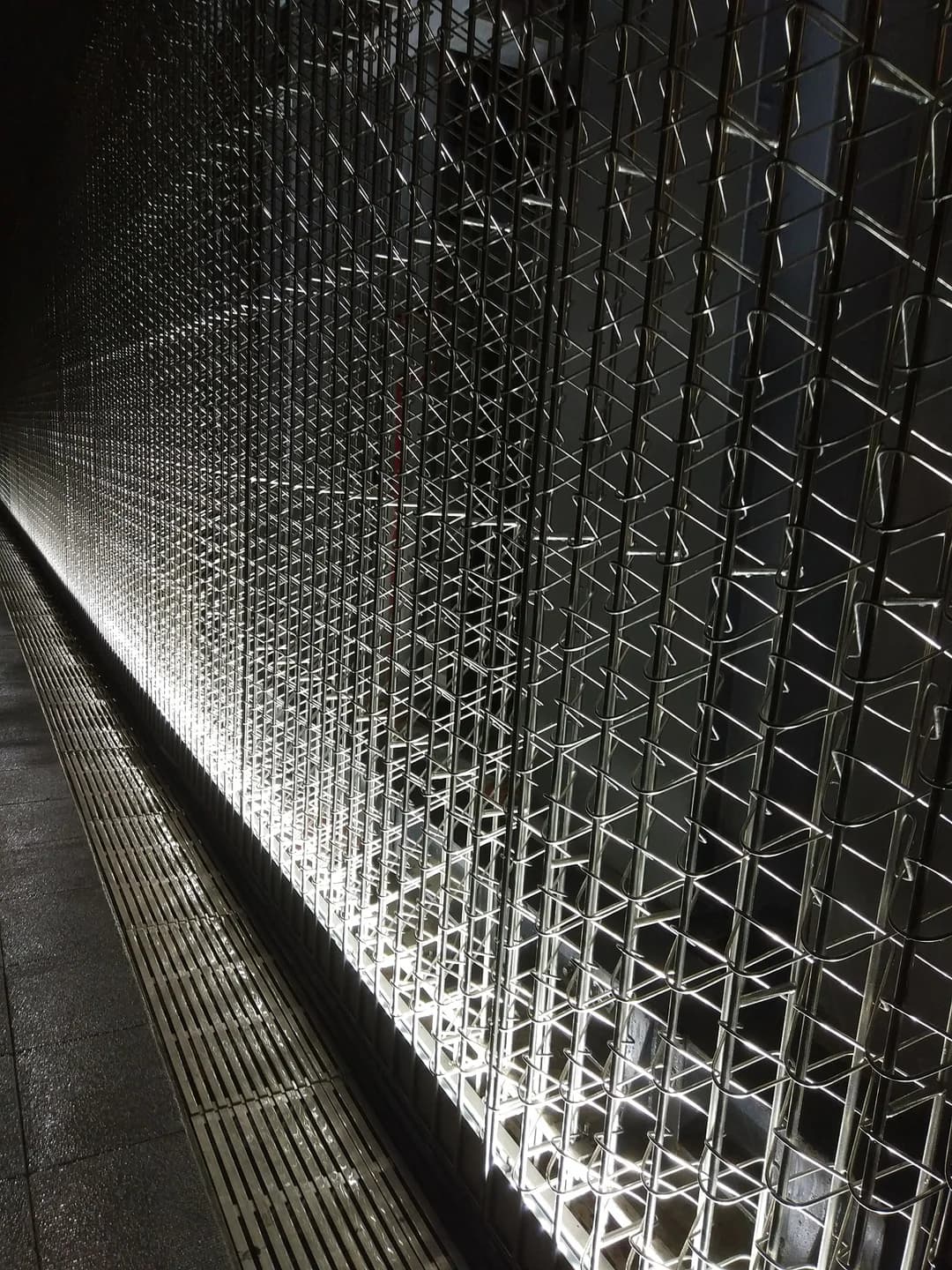 Close view of mesh alongside the Shanghai Shipyard walkway from the project archive